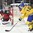 COLOGNE, GERMANY - MAY 21: Sweden's Oscar Lindberg #15 passes the puck infront of Canada's Calvin Pickard #31 net during gold medal game action at the 2017 IIHF Ice Hockey World Championship. (Photo by Matt Zambonin/HHOF-IIHF Images)

